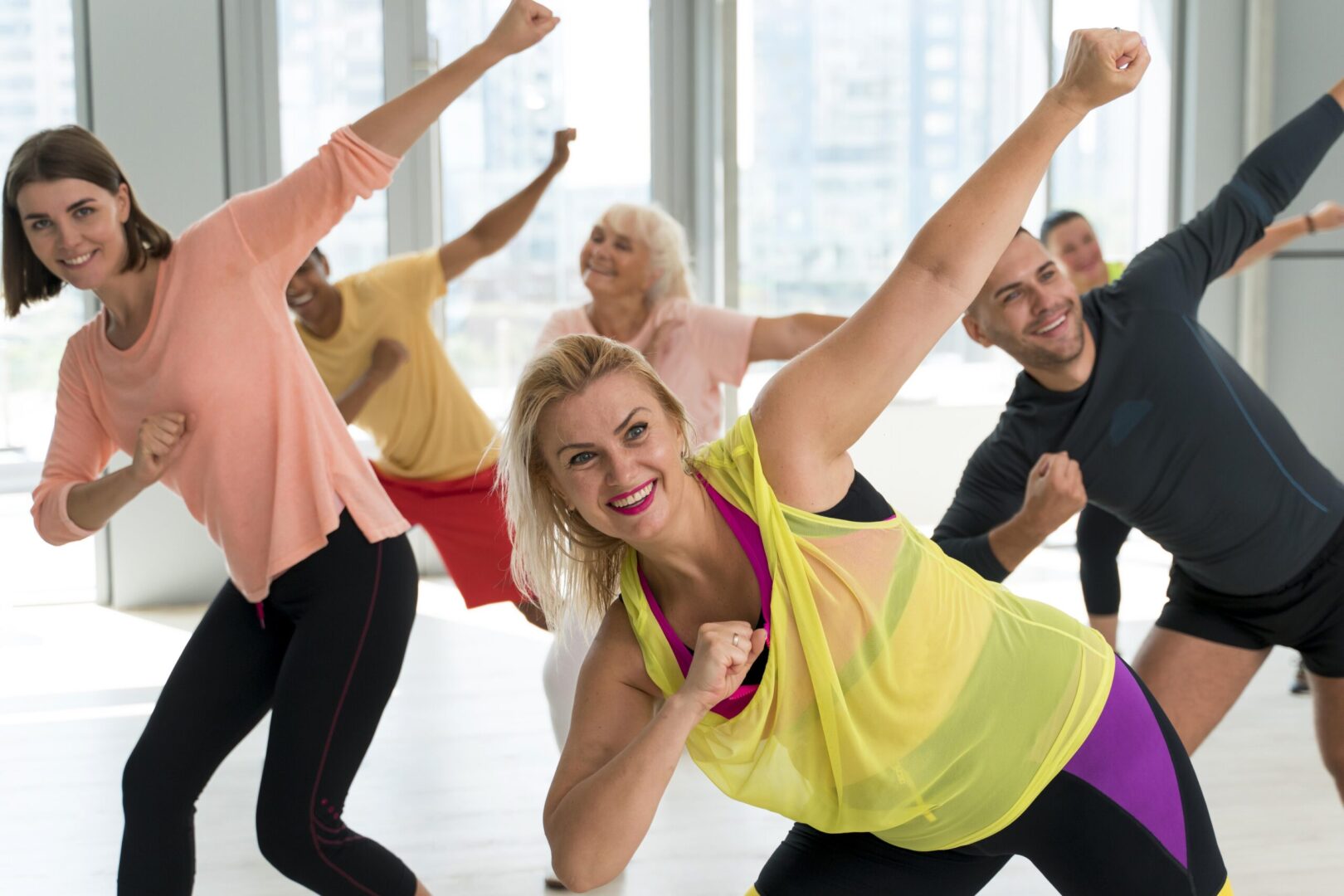 smiley-people-having-fun-zumba-class